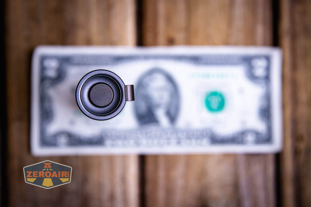 Exceed Designs Rampant R8 flashlight on a two dollar bill