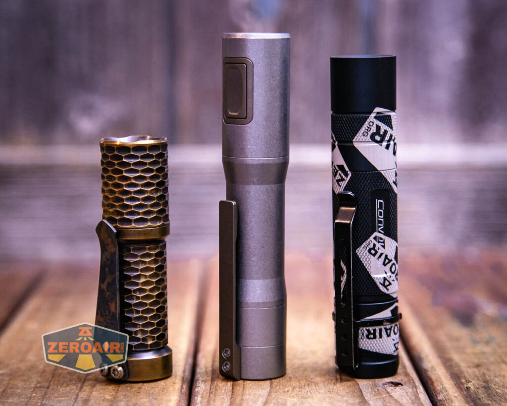 Exceed Designs Rampant R8 flashlight with two standard sized flashlights