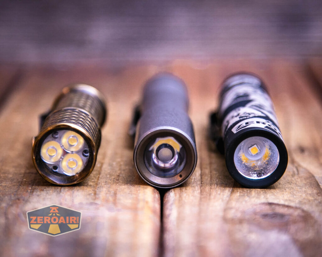 Exceed Designs Rampant R8 flashlight with two standard sized flashlights