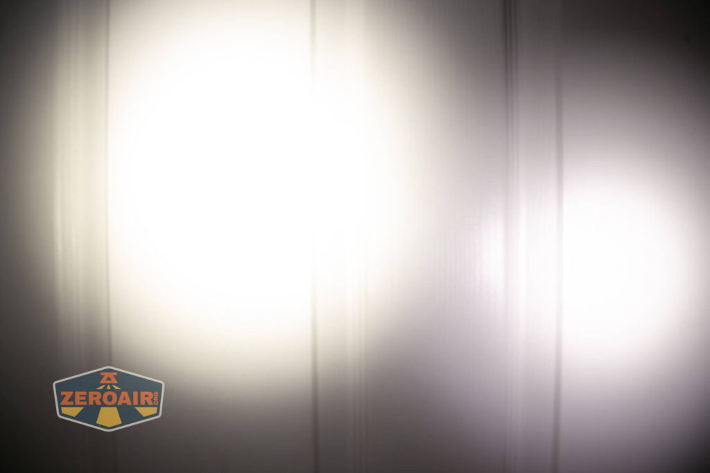 Exceed Designs Rampant R8 flashlight beamshots on door (at 1') compared to nichia 219b 4500K