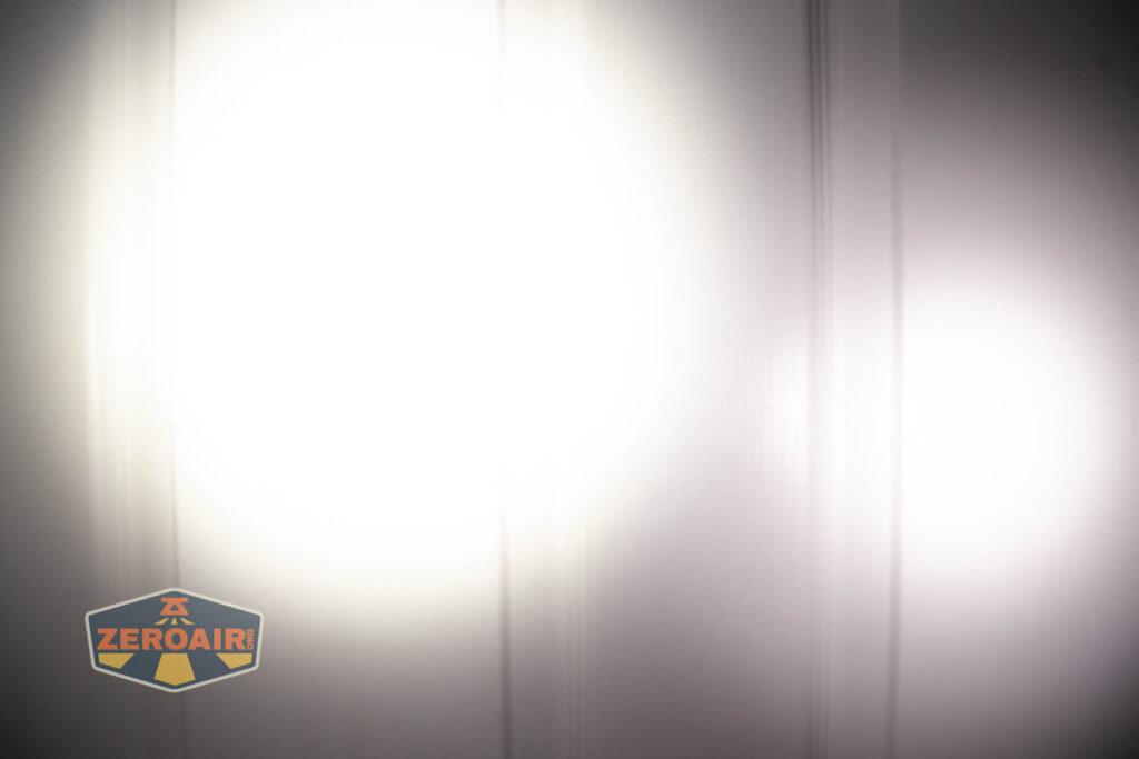 Exceed Designs Rampant R8 flashlight beamshots on door (at 1') compared to nichia 219b 4500K