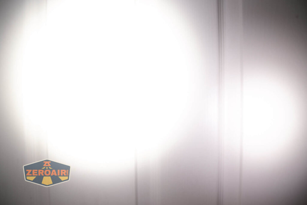 Exceed Designs Rampant R8 flashlight beamshots on door (at 1') compared to nichia 219b 4500K
