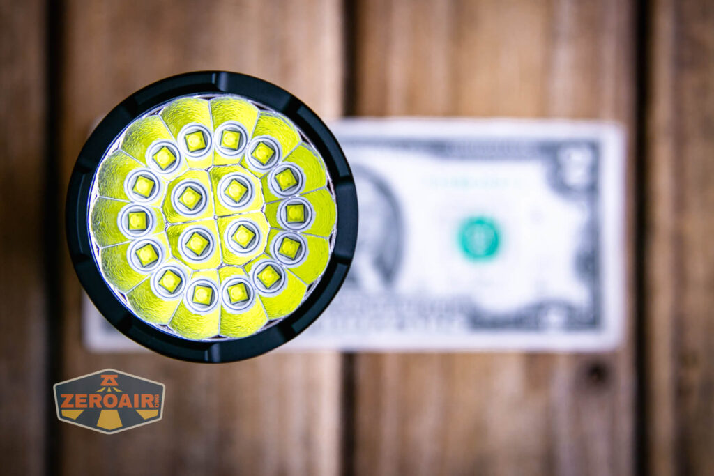 Lumintop GT18 flashlight on a two dollar bill