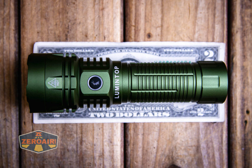 Lumintop W2 LED flashlight on a two dollar bill