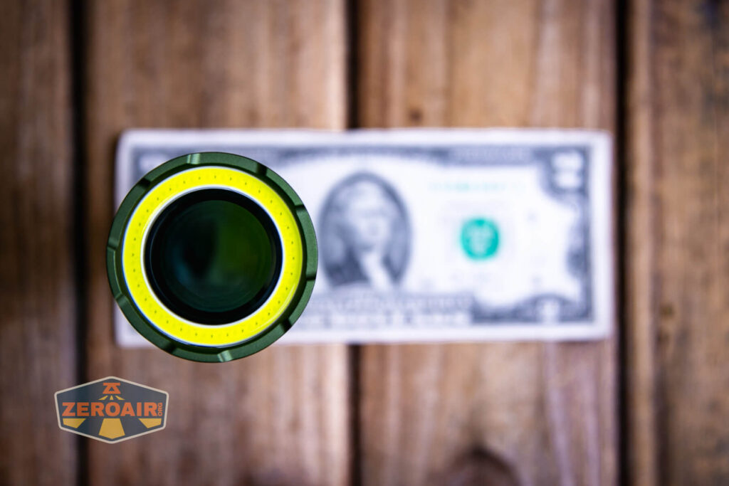 Lumintop W2 LED flashlight on a two dollar bill