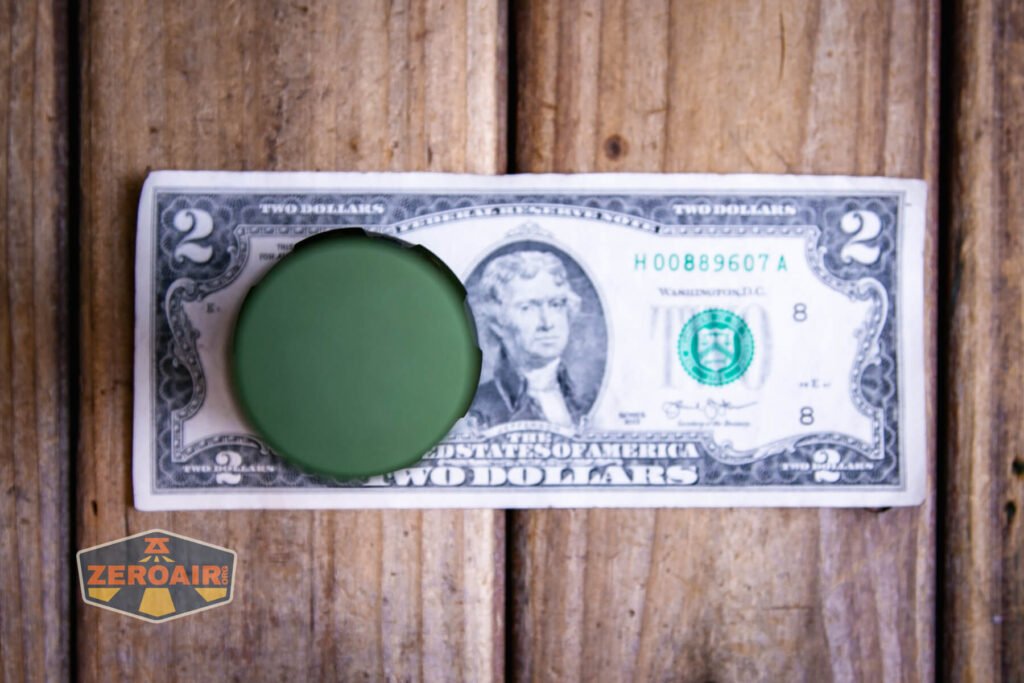 Lumintop W2 LED flashlight on a two dollar bill