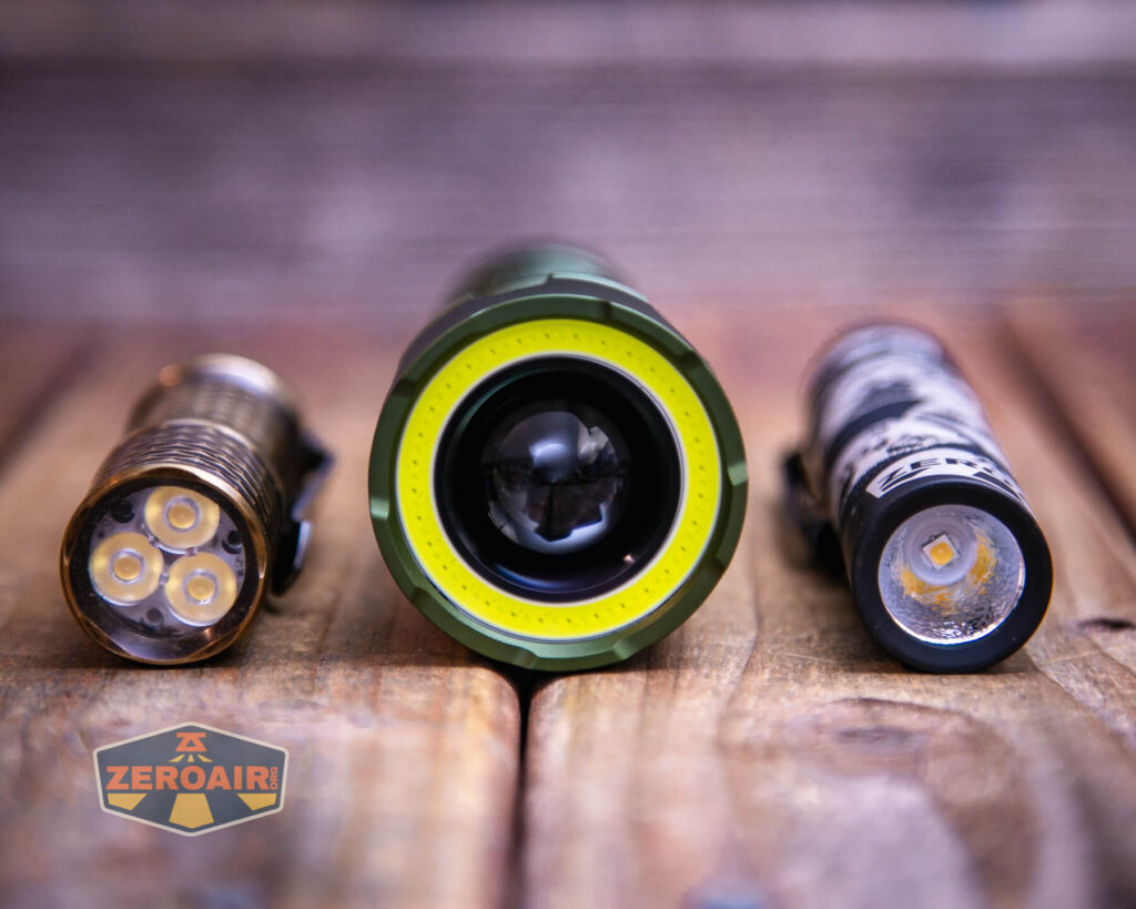 Lumintop W2 LED flashlight with two standard sized flashlights