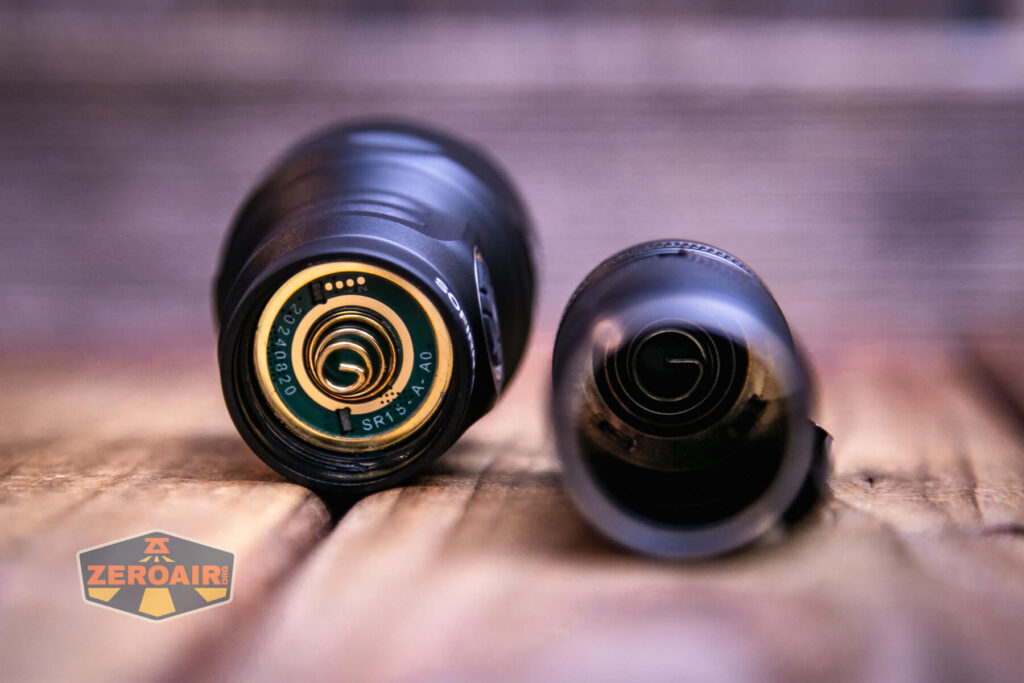 Sofirn SR15 rechargeable flashlight showing dual springs