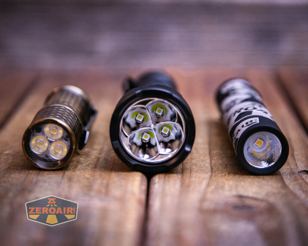 Sofirn SR15 rechargeable flashlight with two standard sized flashlights