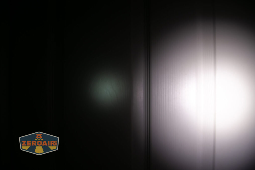 Sofirn SR15 rechargeable flashlight beamshots on door (at 1') compared to nichia 219b 4500K