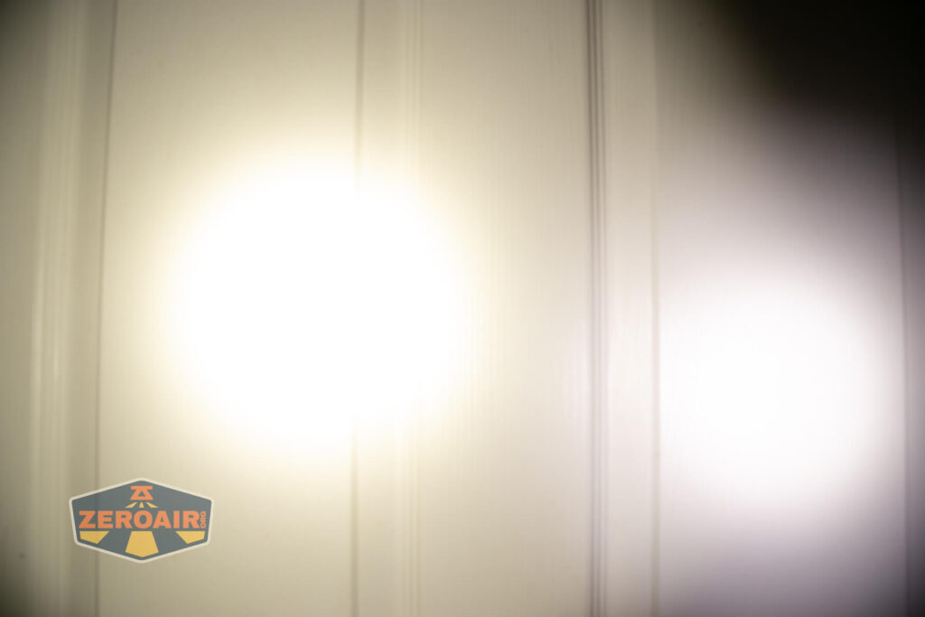 Zebralight SC600w IV Plus HI flashlight beamshots on door (at 1') compared to nichia 219b 4500K