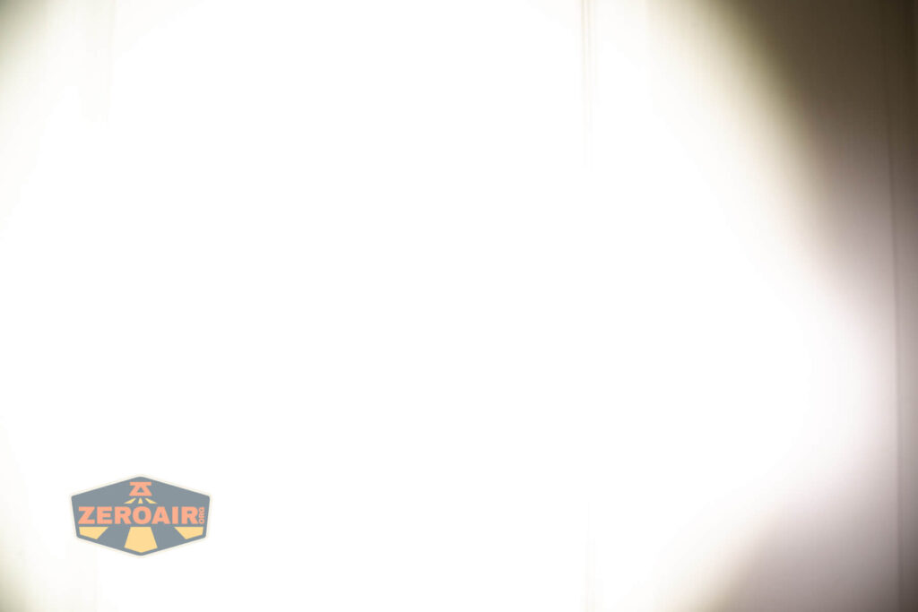 Zebralight SC600w IV Plus HI flashlight beamshots on door (at 1') compared to nichia 219b 4500K