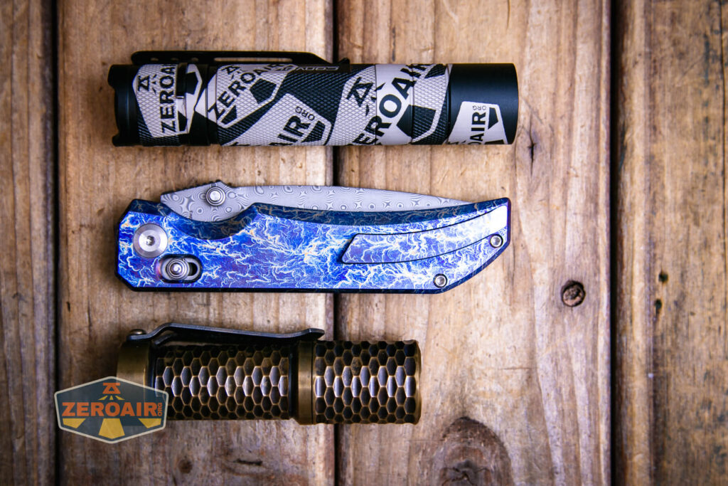 Kansept Eaglestrike knife with two standard sized flashlights