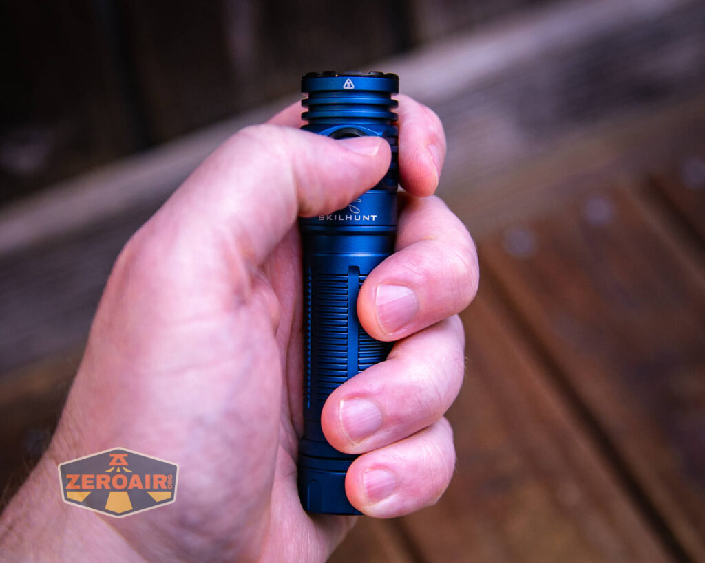 Skilhunt M200 V4 flashlight in hand
