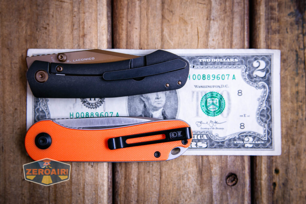 Vosteed Vallhund knife on a two dollar bill compared to Civivi Elementum in orange