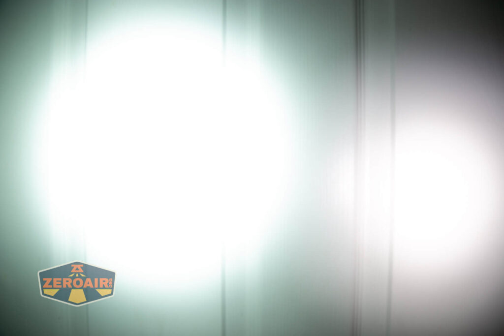 Wuben X4 flashlight beamshots on door (at 1') compared to nichia 219b 4500K