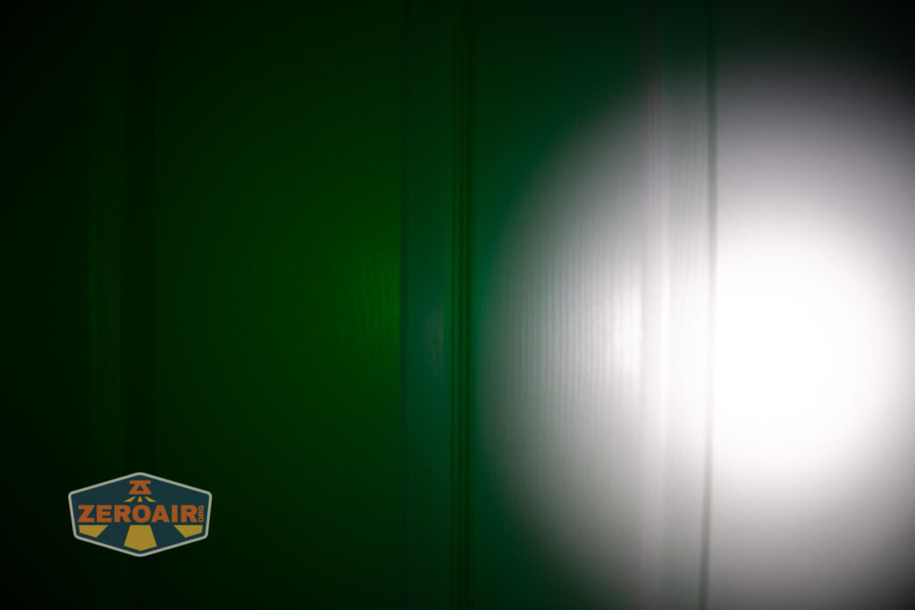 Wuben X4 flashlight beamshots on door (at 1') compared to nichia 219b 4500K