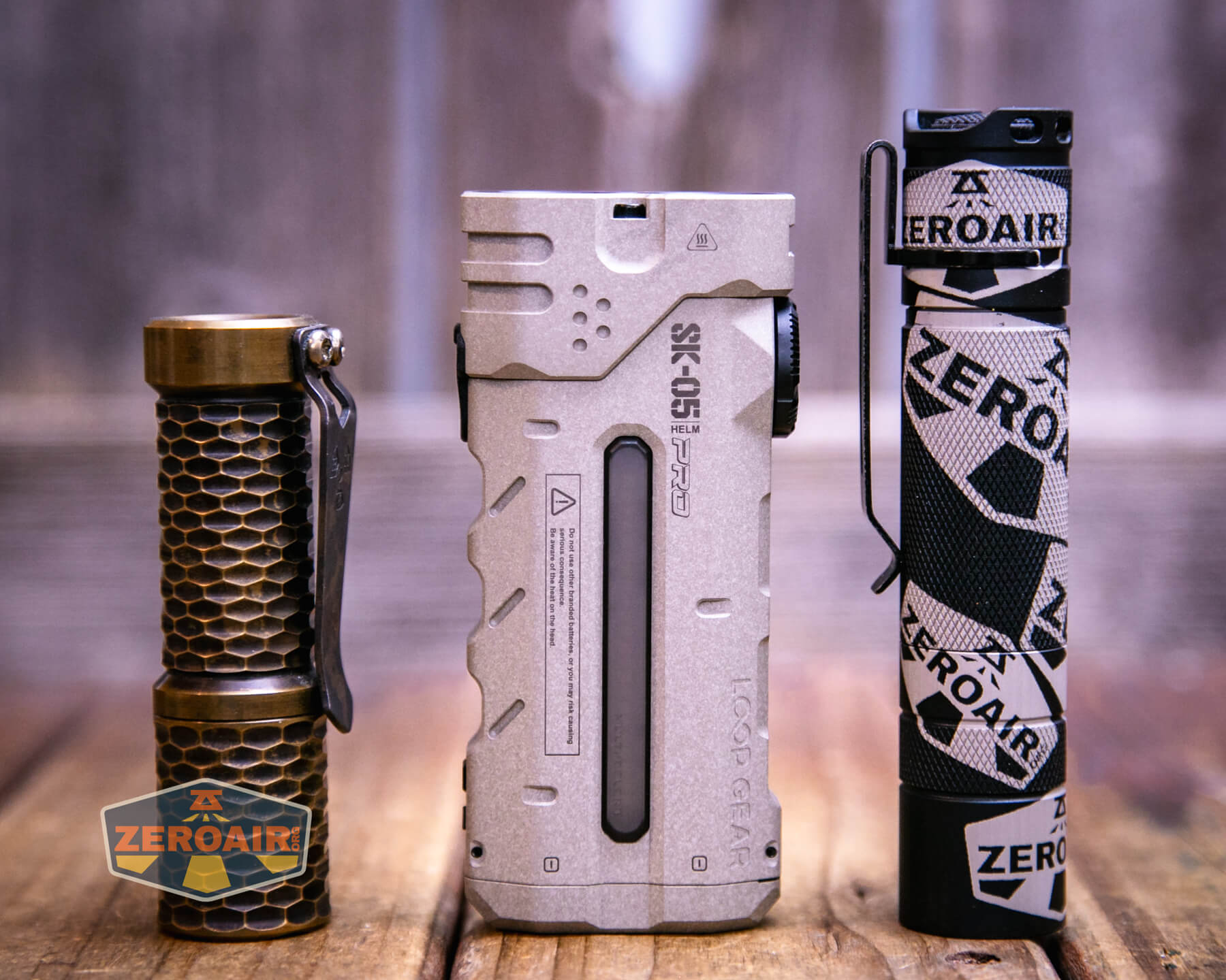 LoopGear SK-05 Pro MAO flashlight with two standard sized flashlights