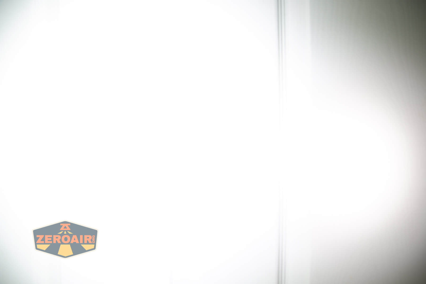 LoopGear SK-05 Pro MAO flashlight beamshots on door (at 1') compared to nichia 219b 4500K