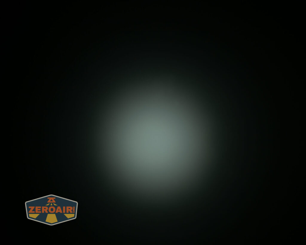 Nitecore HC65 UHE headlamp beamshots on ceiling