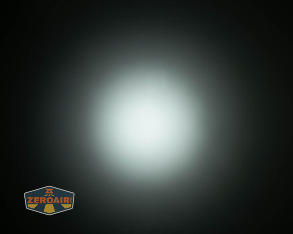 Nitecore HC65 UHE headlamp beamshots on ceiling