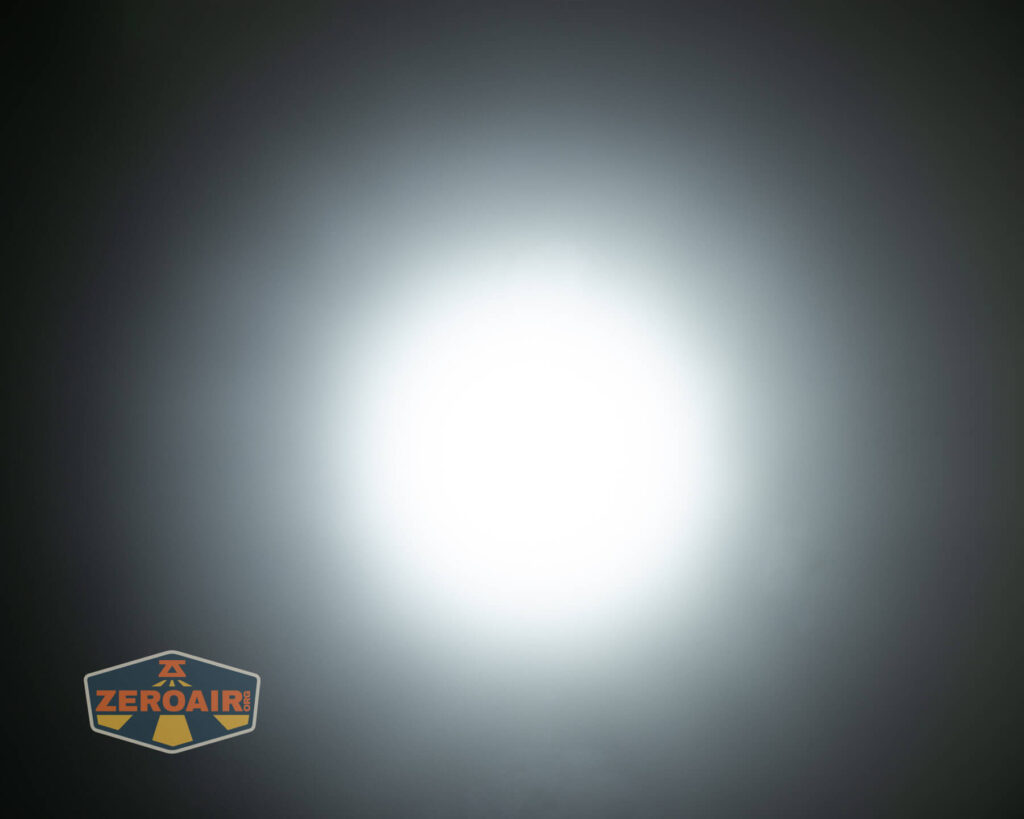 Nitecore HC65 UHE headlamp beamshots on ceiling