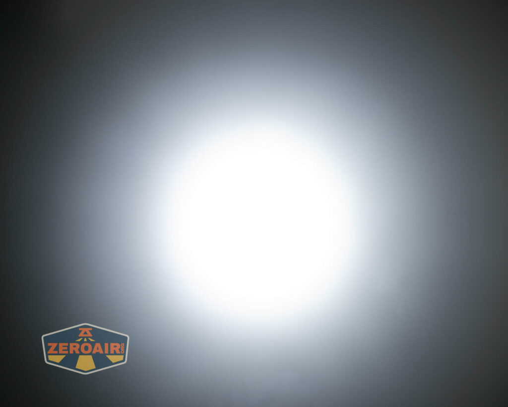 Nitecore HC65 UHE headlamp beamshots on ceiling