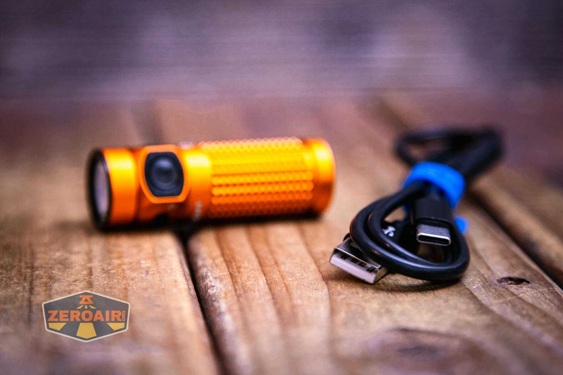 Olight Baton 4 Premium flashlight included charging cable