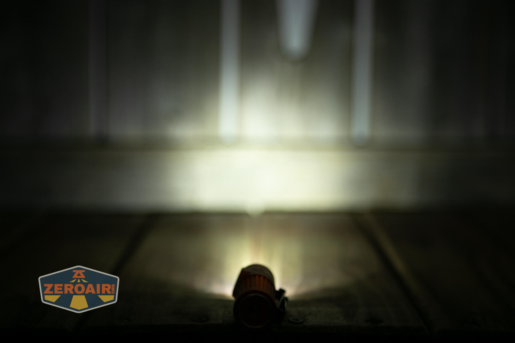 Olight Baton 4 Premium flashlight emitter on