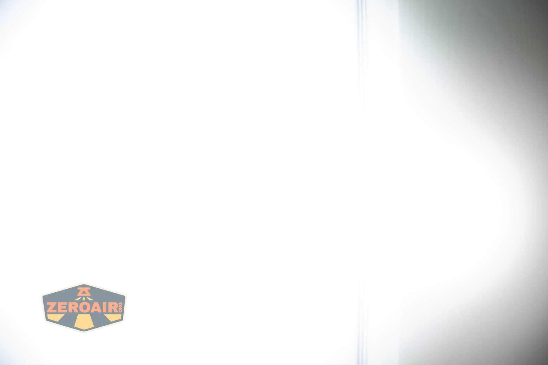 Olight Baton 4 Premium flashlight beamshots on door (at 1') compared to nichia 219b 4500K