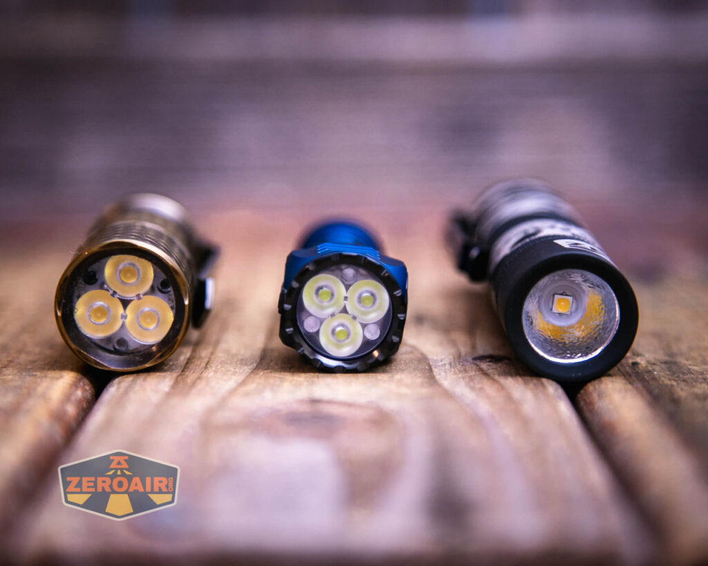 Skilhunt EC150 Luminus SFT25R flashlight with two standard sized flashlights