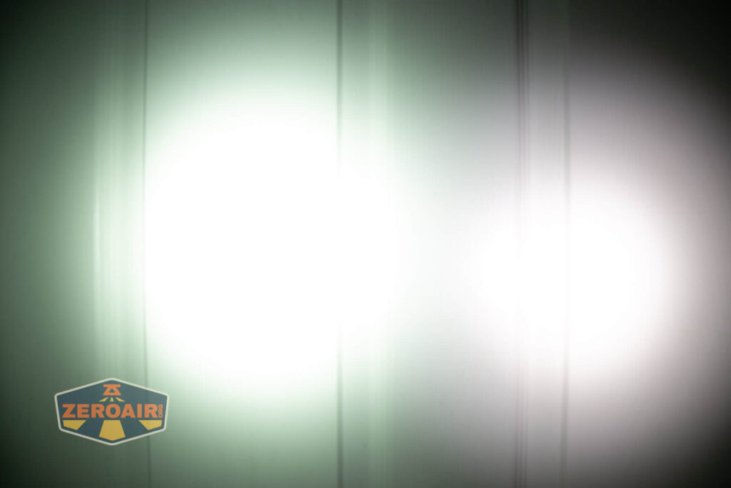 Skilhunt EC150 Luminus SFT25R flashlight beamshots on door (at 1') compared to nichia 219b 4500K