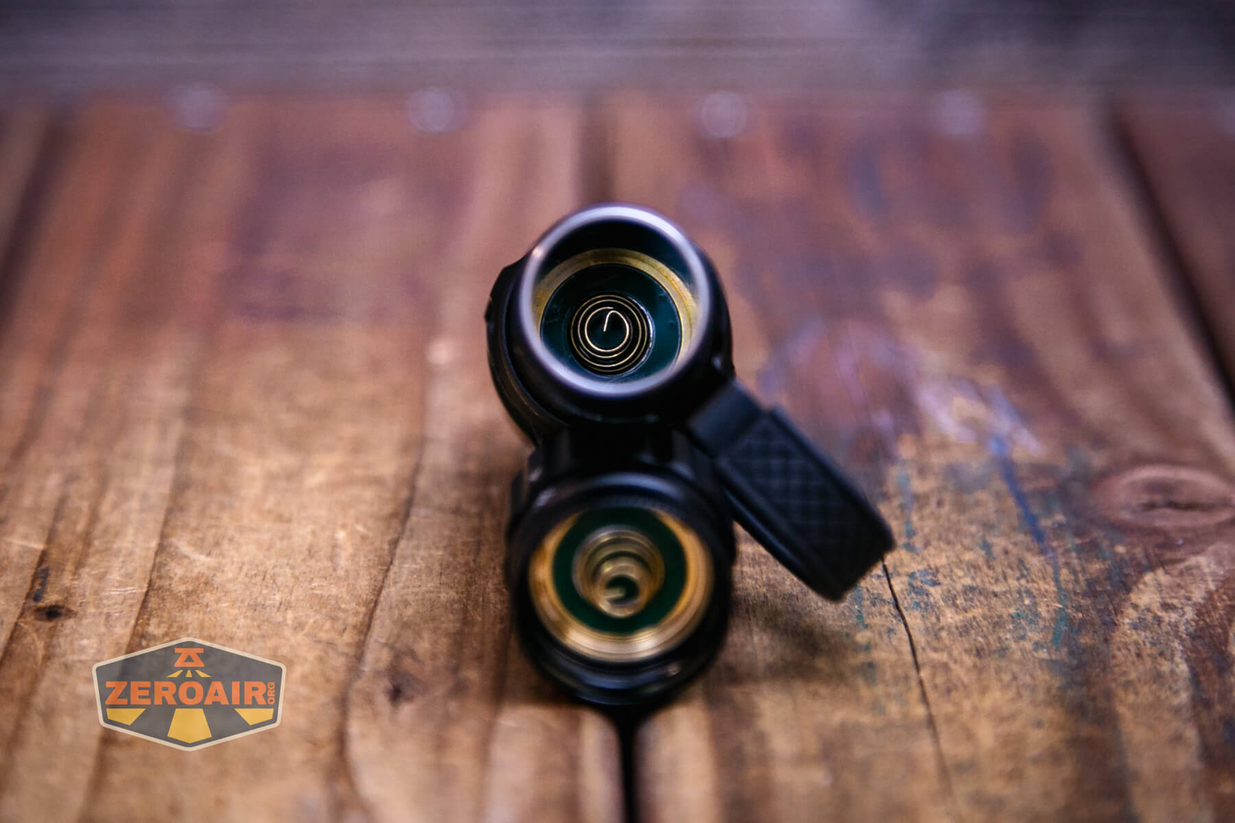 Wurkkos TD07 tactical flashlight showing head spring