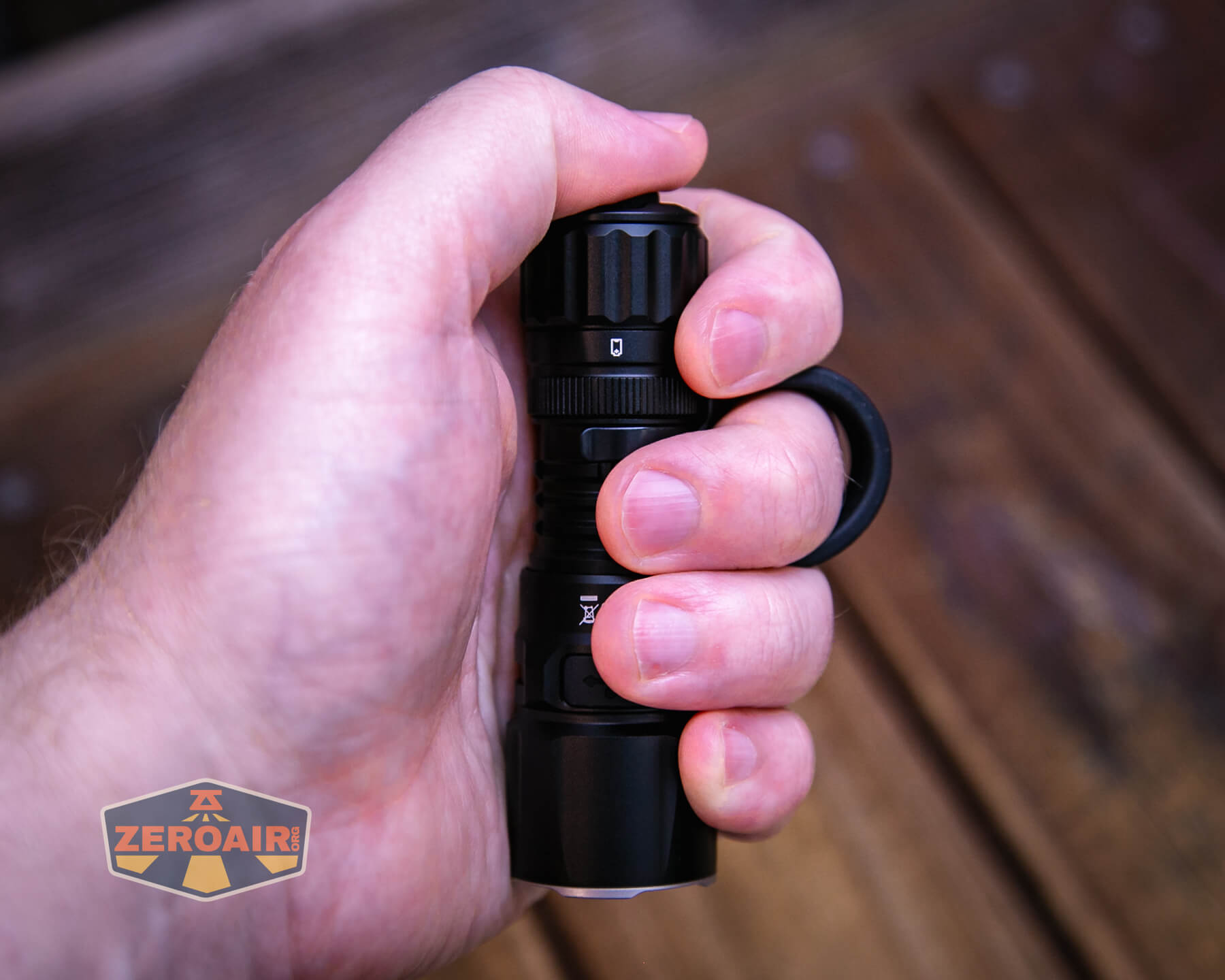 Wurkkos TD07 tactical flashlight in hand
