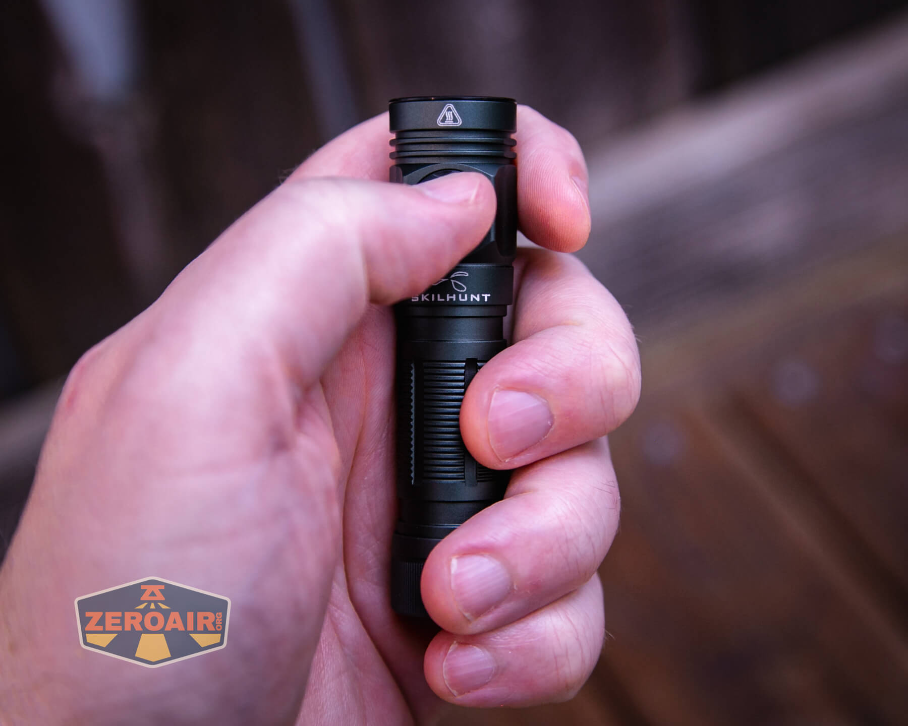 Skilhunt M150v4 Luminus SFT25R flashlight in hand