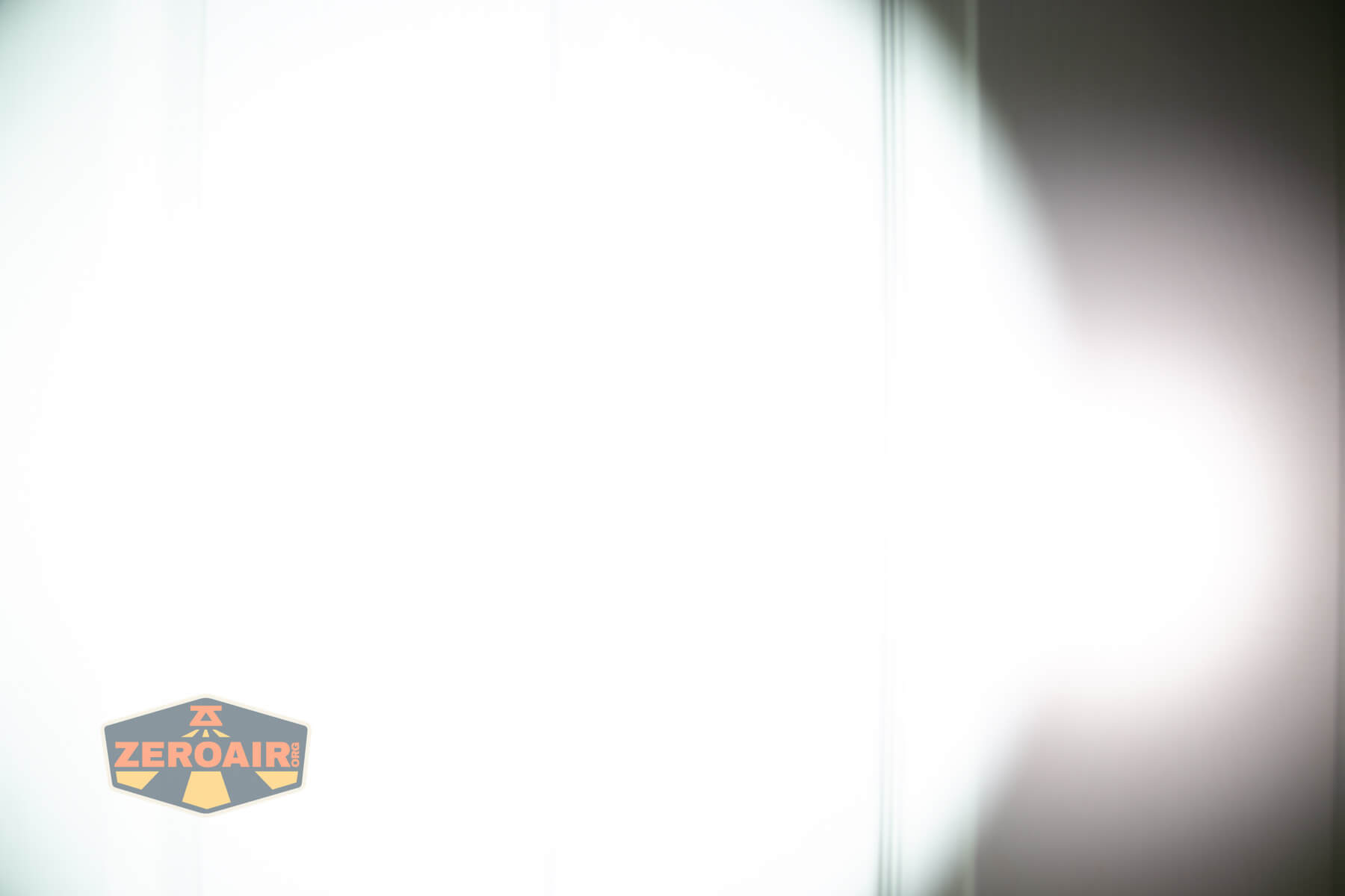 Skilhunt M150v4 Luminus SFT25R flashlight beamshots on door (at 1') compared to nichia 219b 4500K