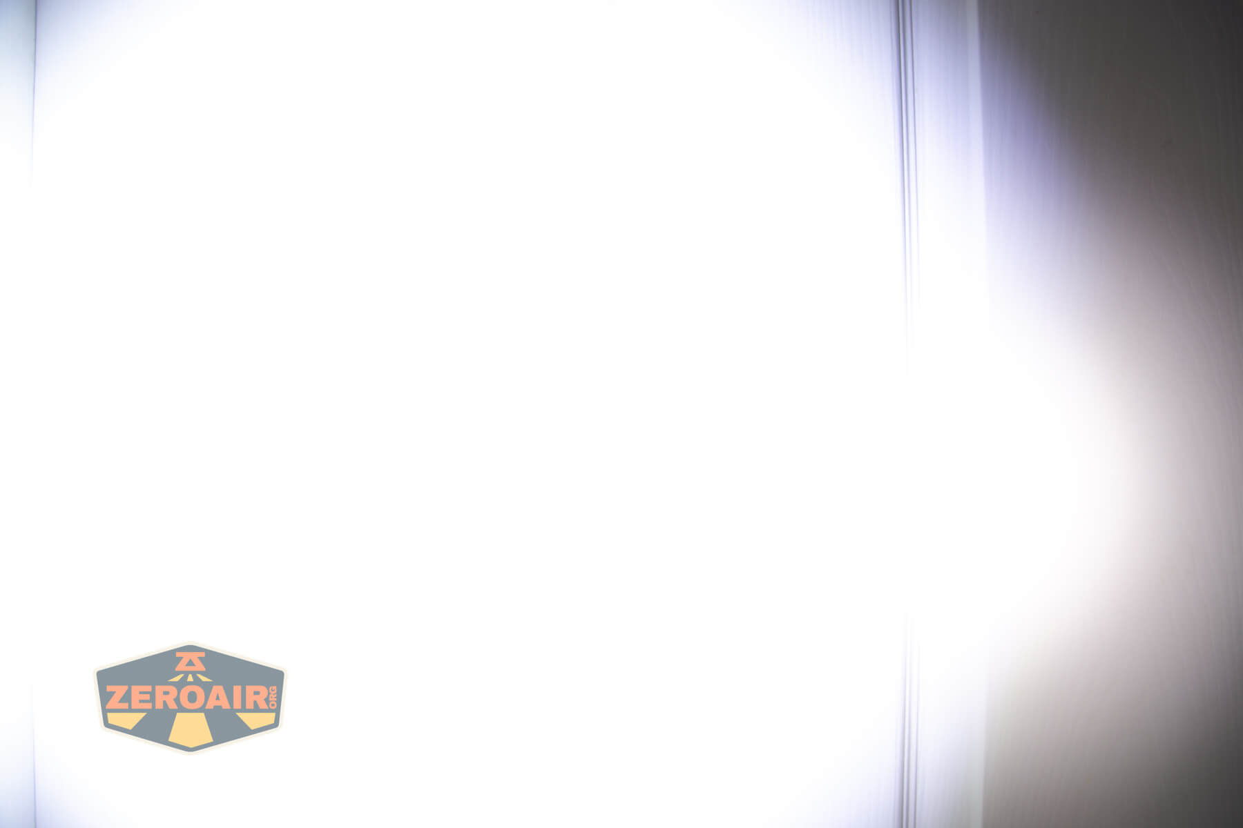 Thrunite Defender flashlight beamshots on door (at 1') compared to nichia 219b 4500K