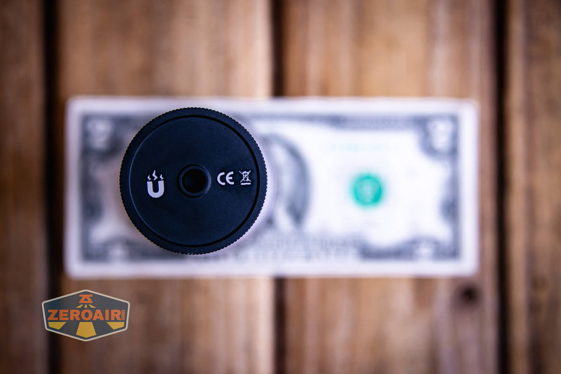 Trustfire TC50 camping flashlight on two dollar bill
