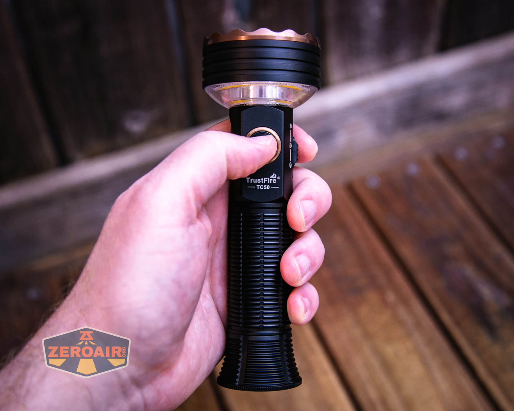 Trustfire TC50 camping flashlight in hand