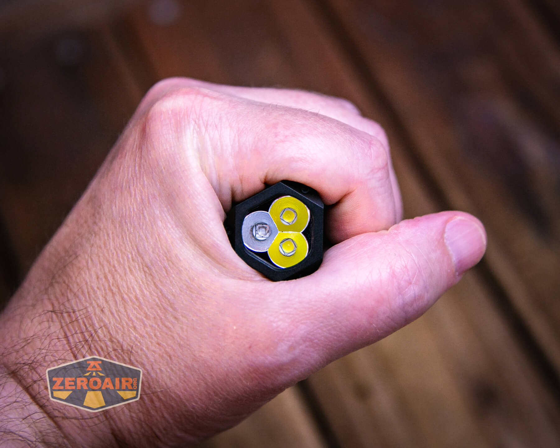 Wuben E8 modular flashlight in hand