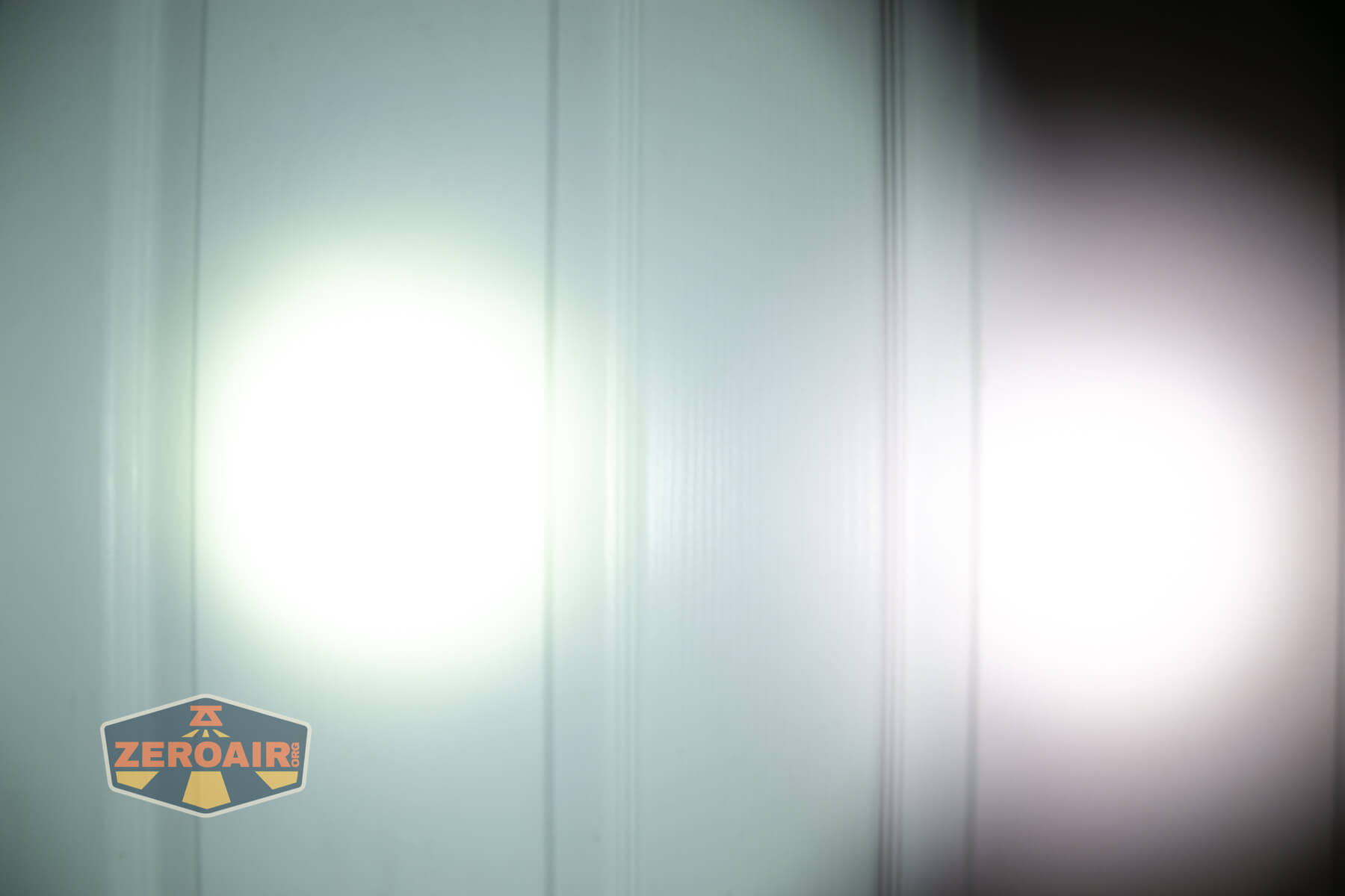Wuben L3 flashlight on door compared to nichia 219b