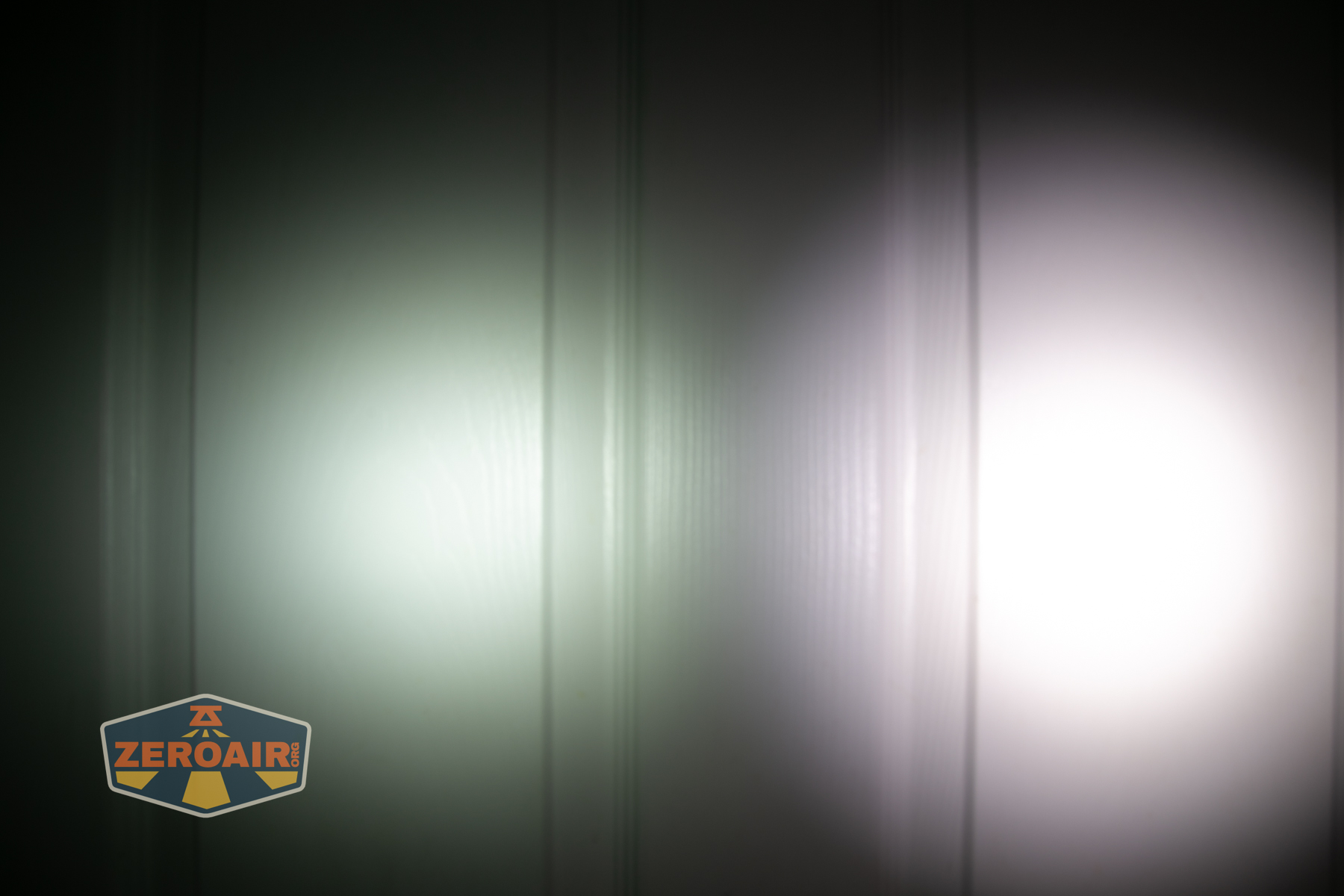 Wurkkos HD03 clip flashlight beamshots on door (at 1') compared to nichia 219b 4500K