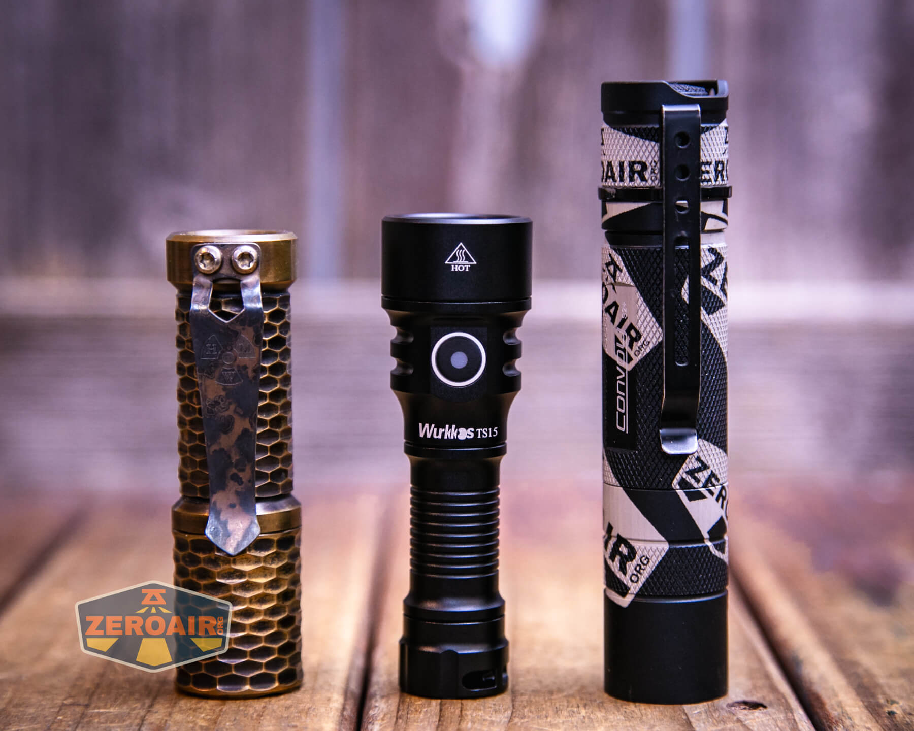 Wurkkos TS15 mini thrower flashlight with two standard sized flashlights