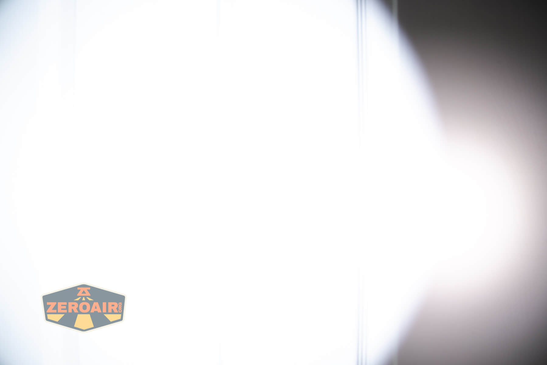 Wurkkos TS15 mini thrower flashlight beamshots on door (at 1') compared to nichia 219b 4500K