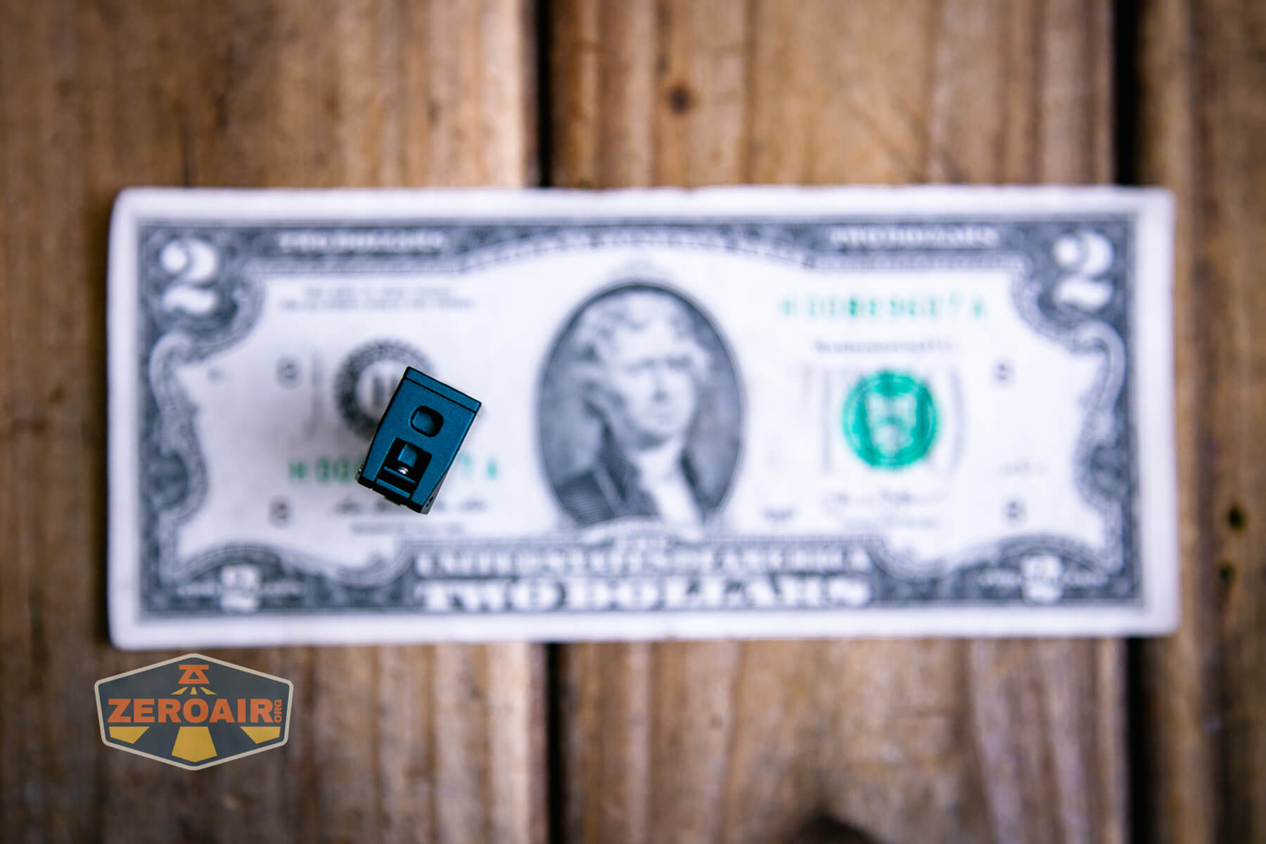 Acebeam Keylite 500 keychain flashlight on a two dollar bill