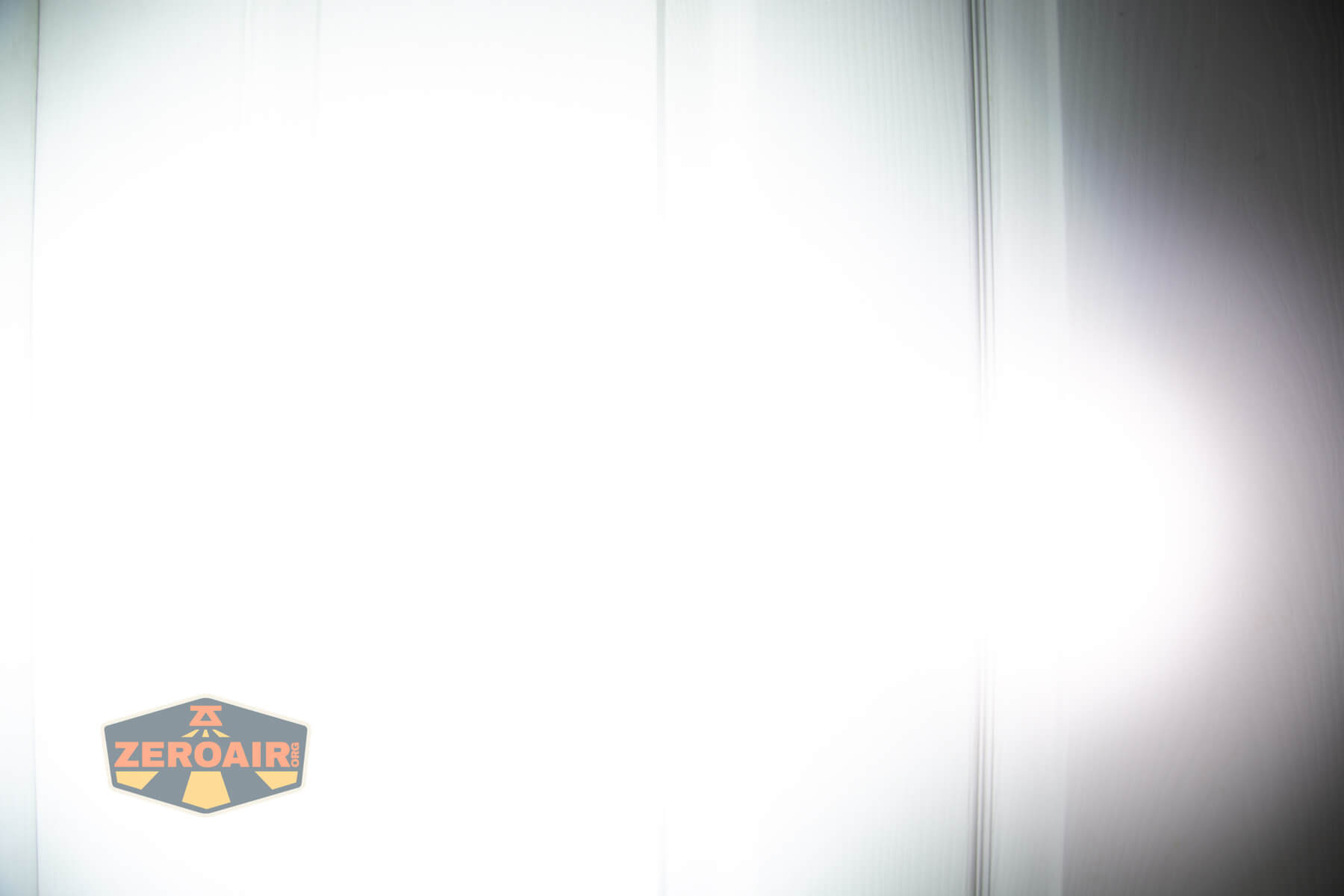 Acebeam Keylite 500 keychain flashlight beamshots on door (at 1') compared to nichia 219b 4500K