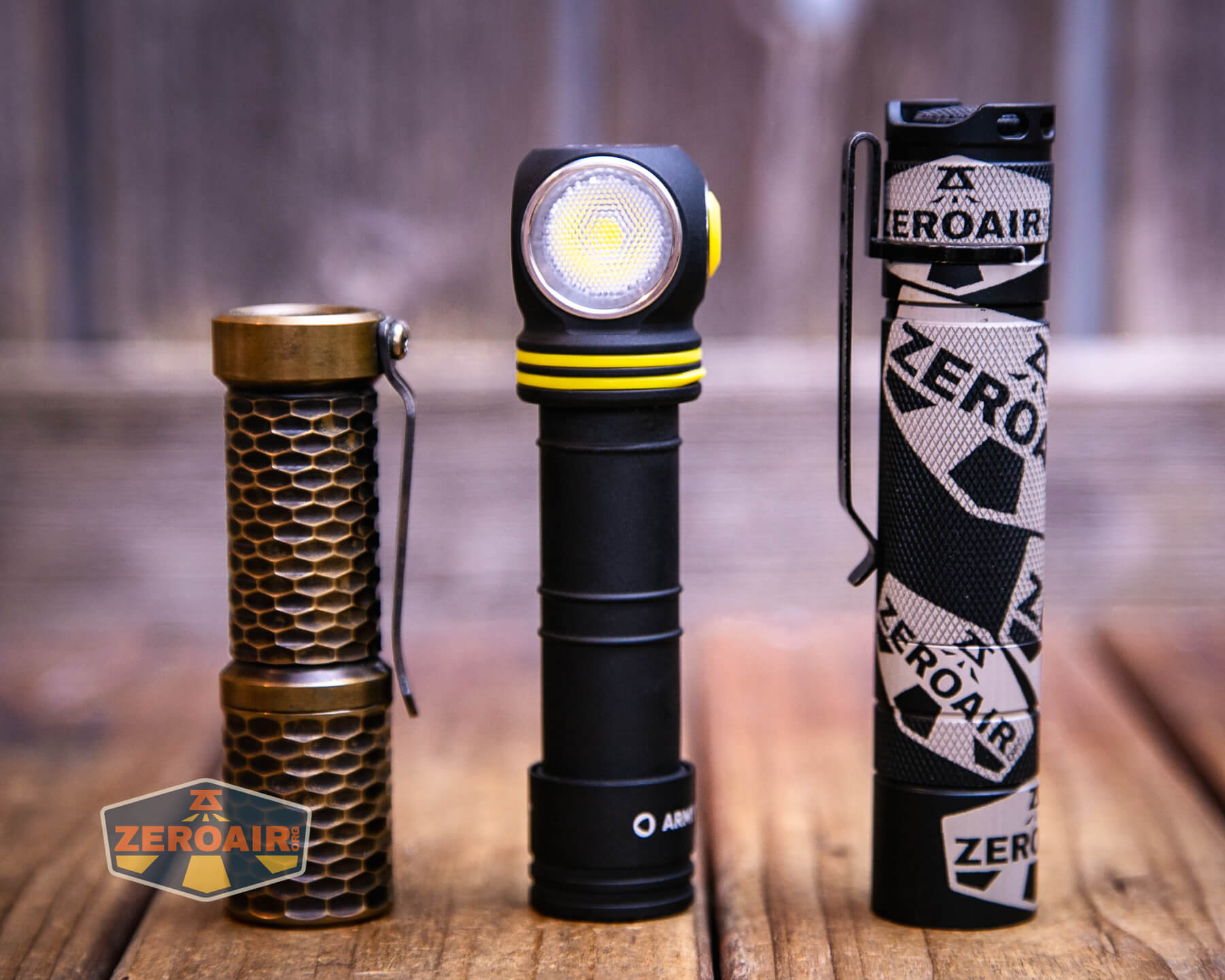 Armytek Elf C2 Warm headlamp with two standard sized flashlights