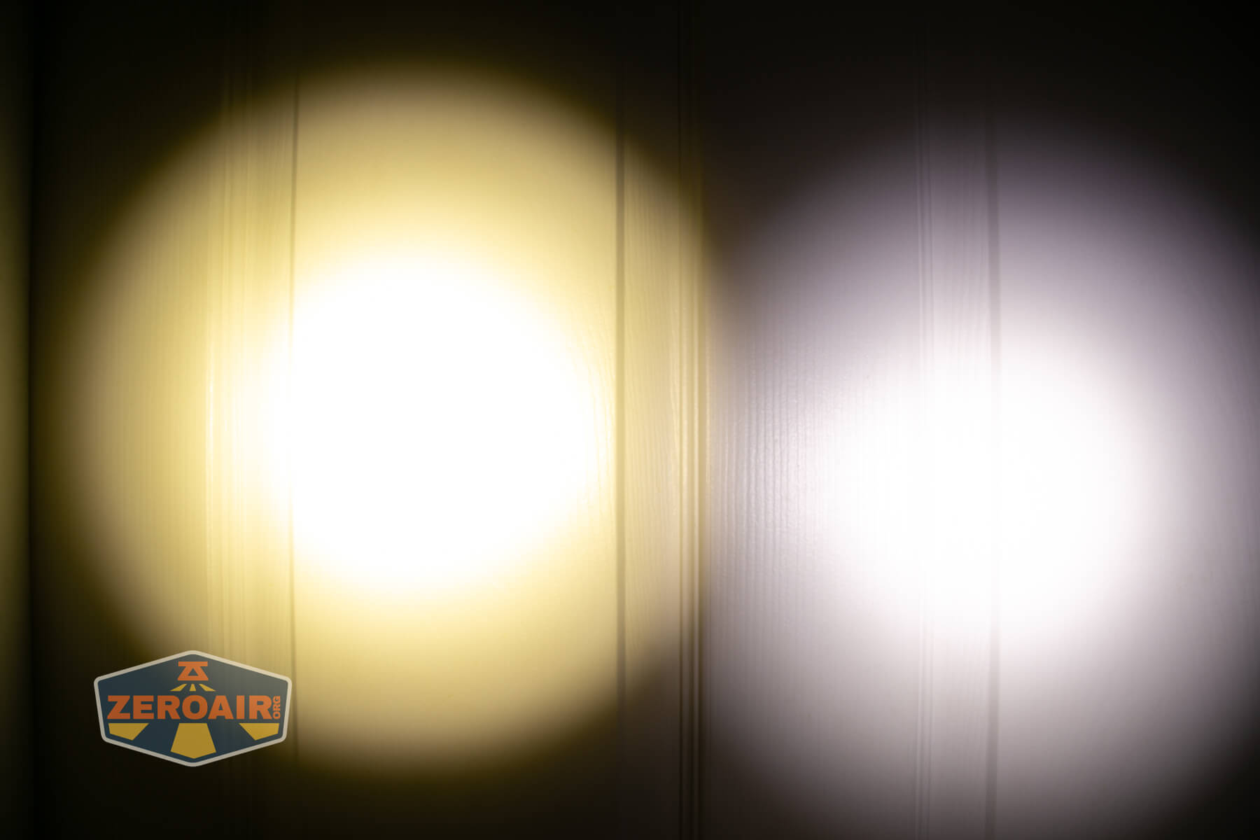 Armytek Viking Pro Magnet USB tactical flashlight beamshots on door (at 1') compared to nichia 219b 4500K