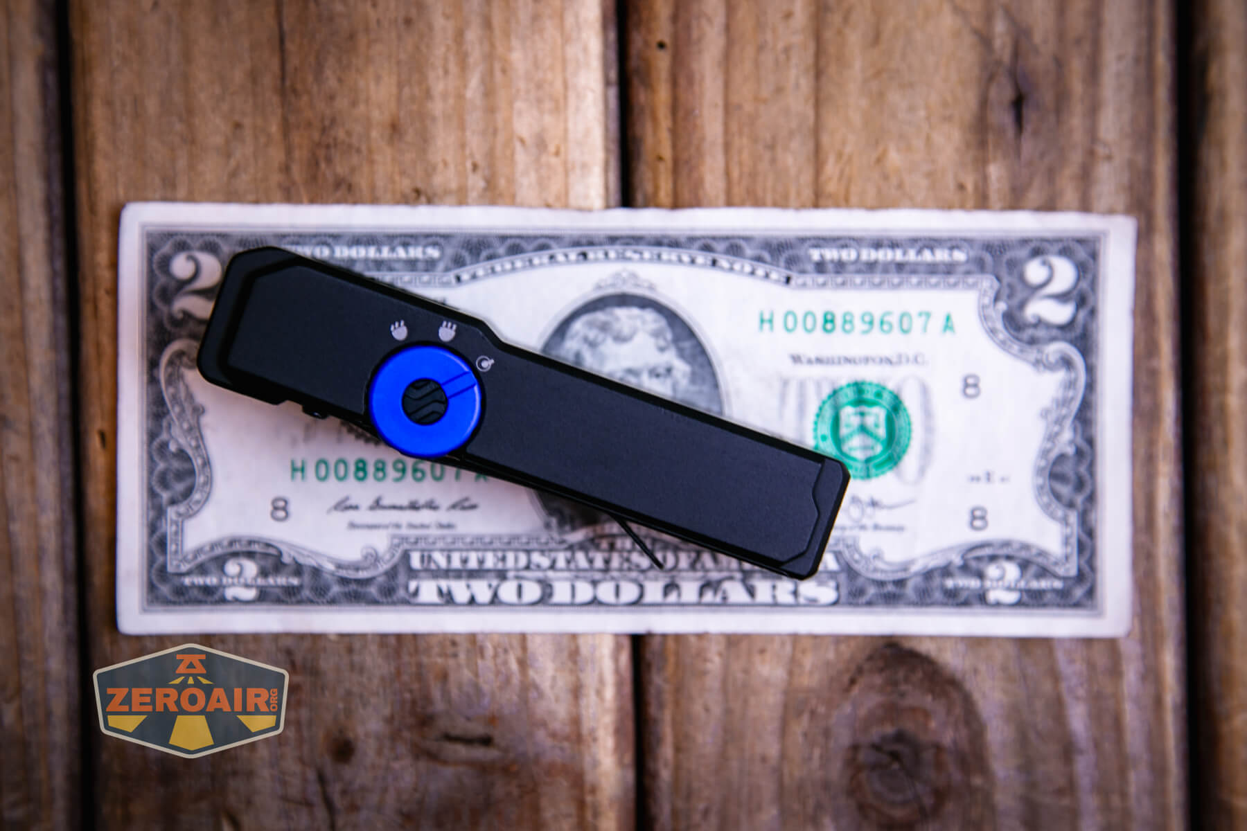 Imalent GR36 flashlight on a two dollar bill