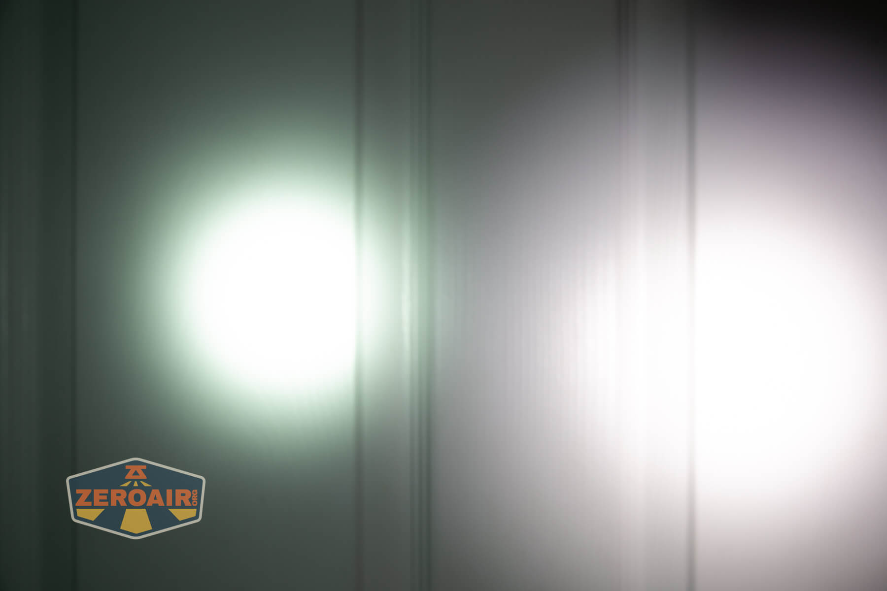 Imalent GR36 flashlight beamshots on door (at 1') compared to nichia 219b 4500K